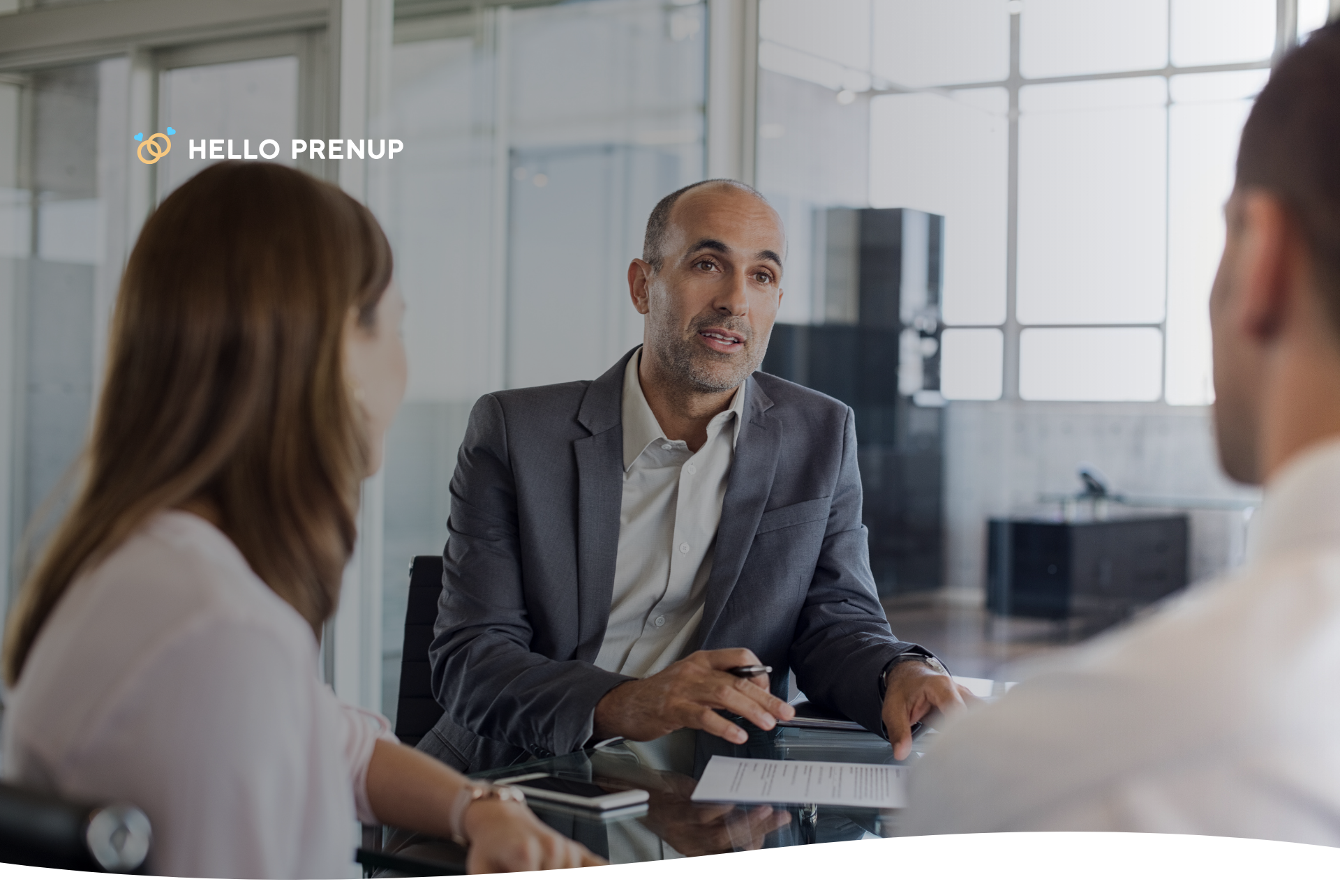 financial-advisor-explaining-to-client A financial advisor or trustee explaining complex financial concepts to a client, representing professional management of inherited funds.