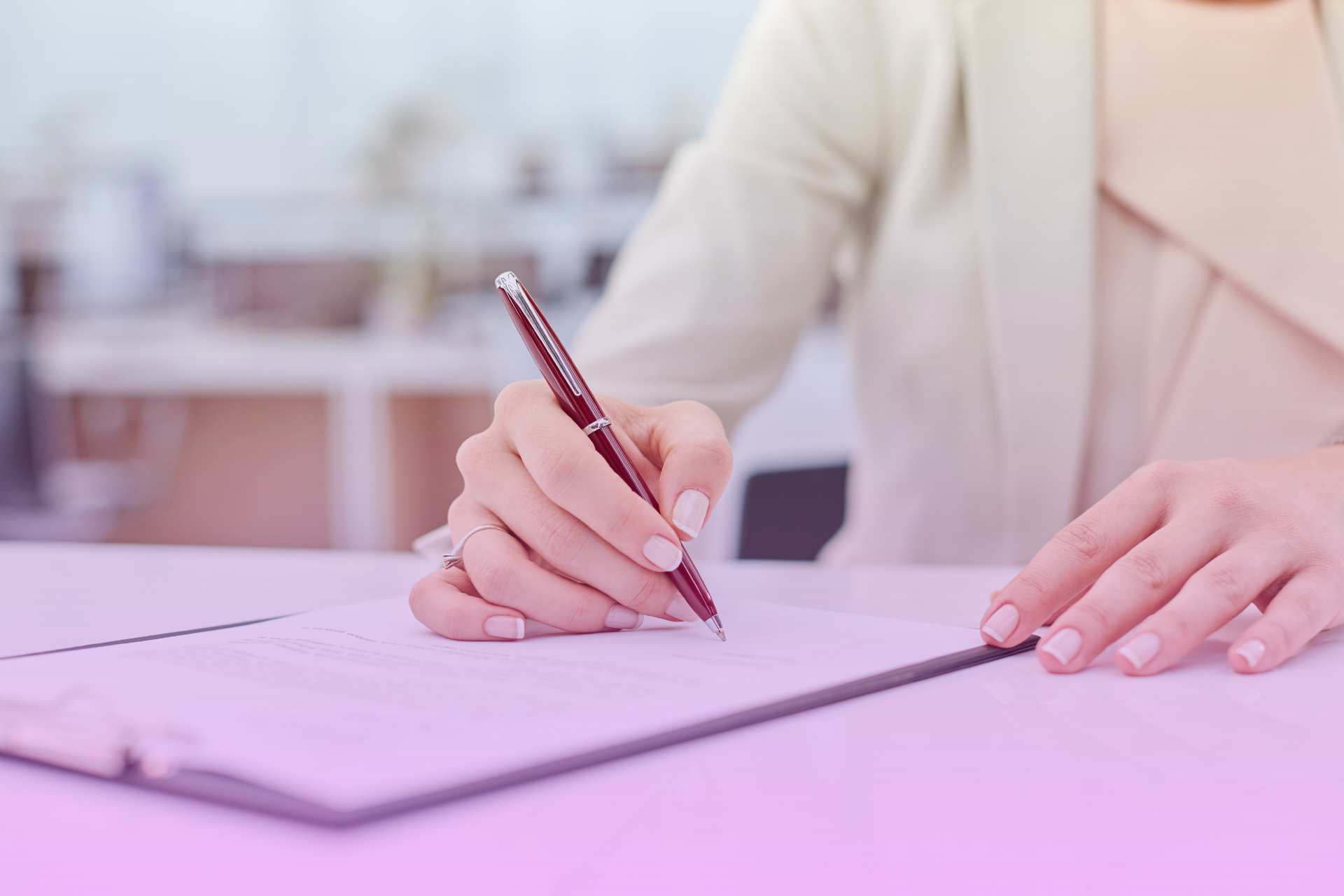 A hand holding a pen, signing a document, with seven important bullet points visible next to it.