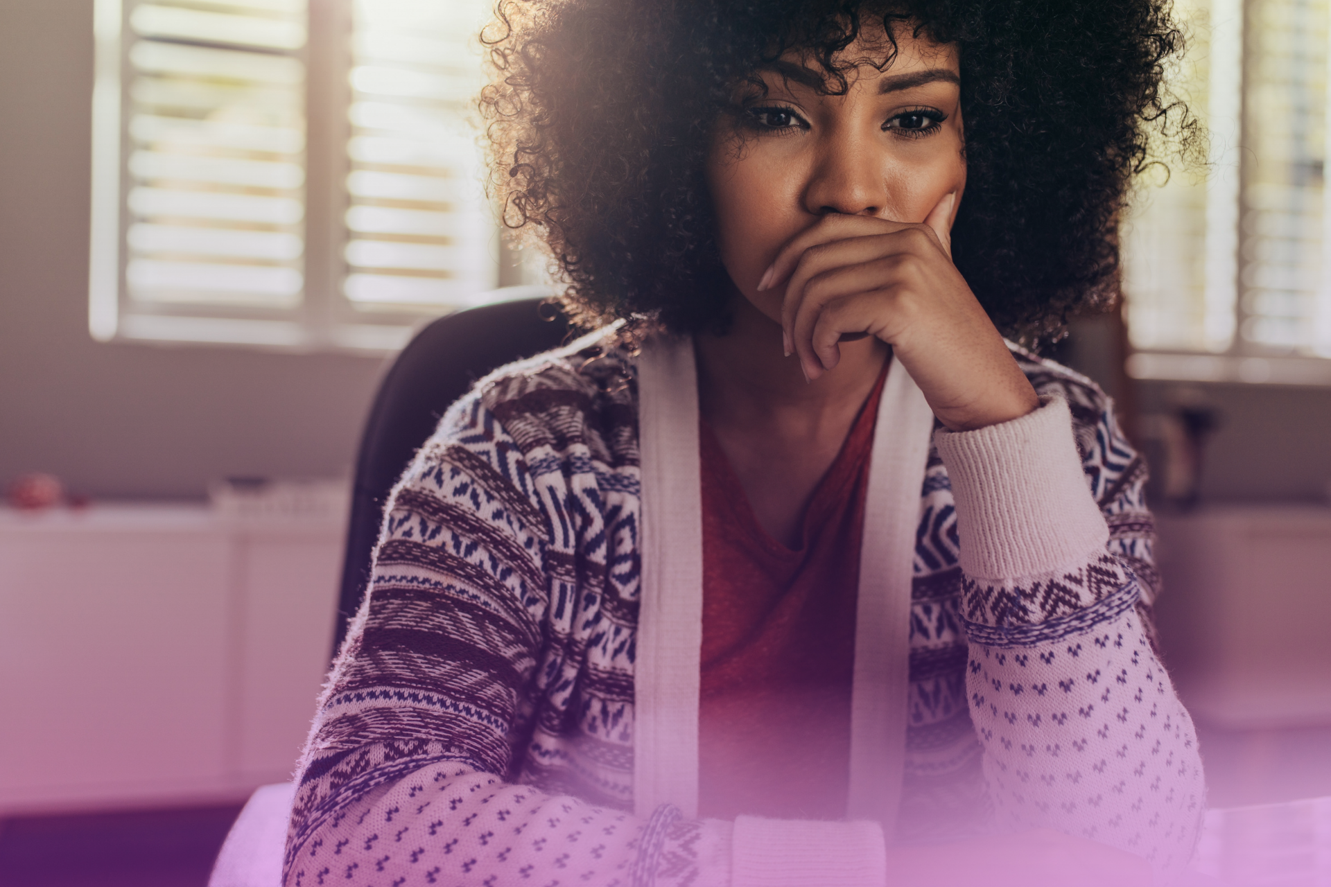 A person with a thoughtful expression, contemplating a complex legal decision or document.