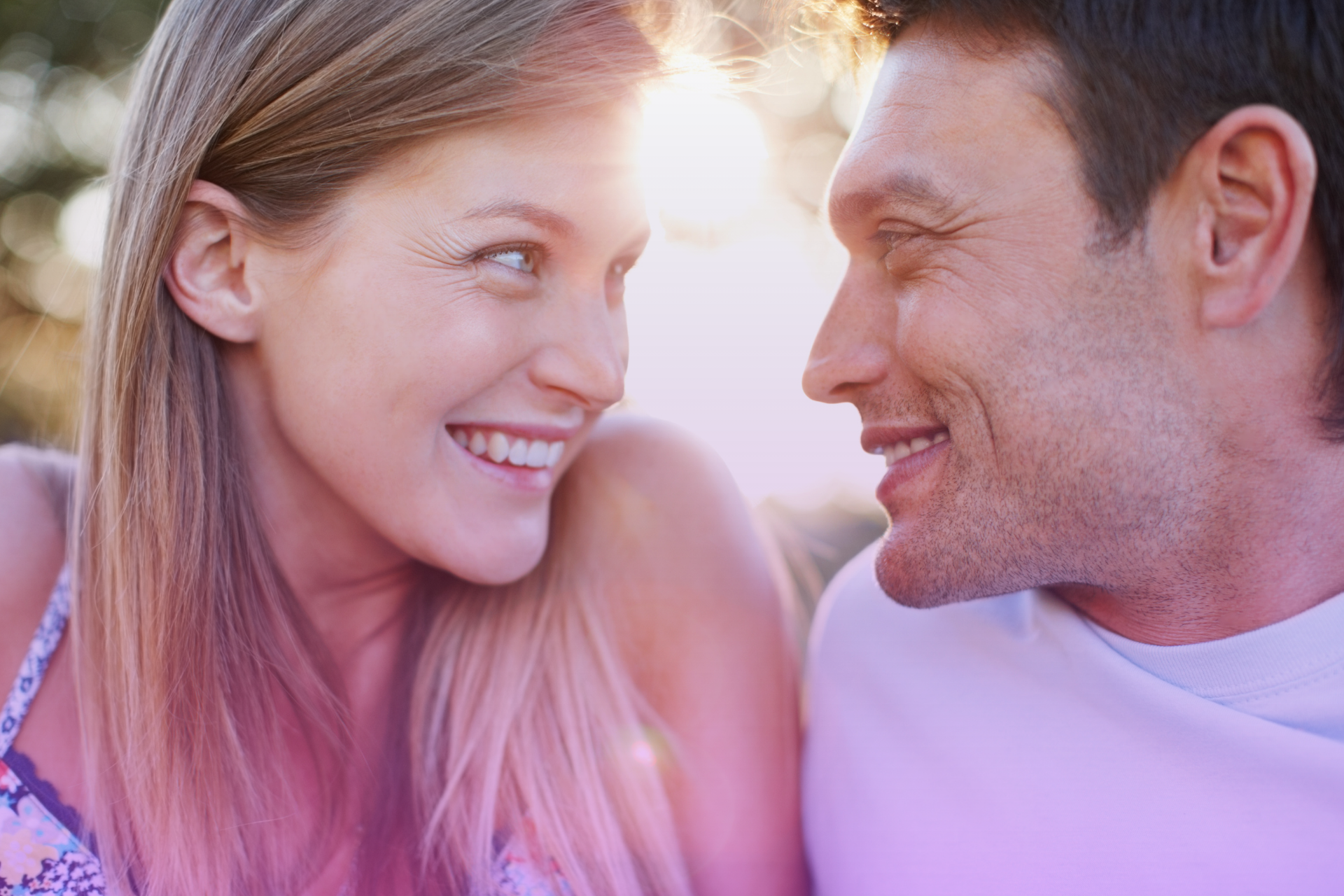 A couple looks at each other with reassuring expressions, symbolizing the security and peace of mind that comes from proactively addressing this topic.