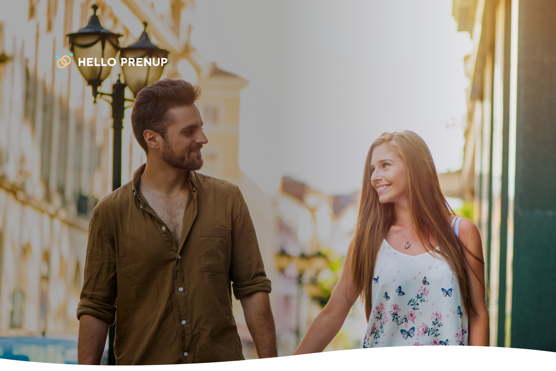 A couple holding hands and smiling warmly, symbolizing the successful rebuilding of trust and a renewed connection.