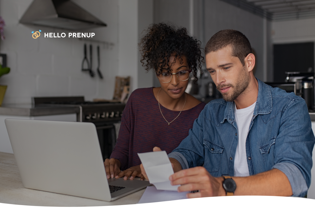 California couple reviewing prenup pricing documents on a laptop together