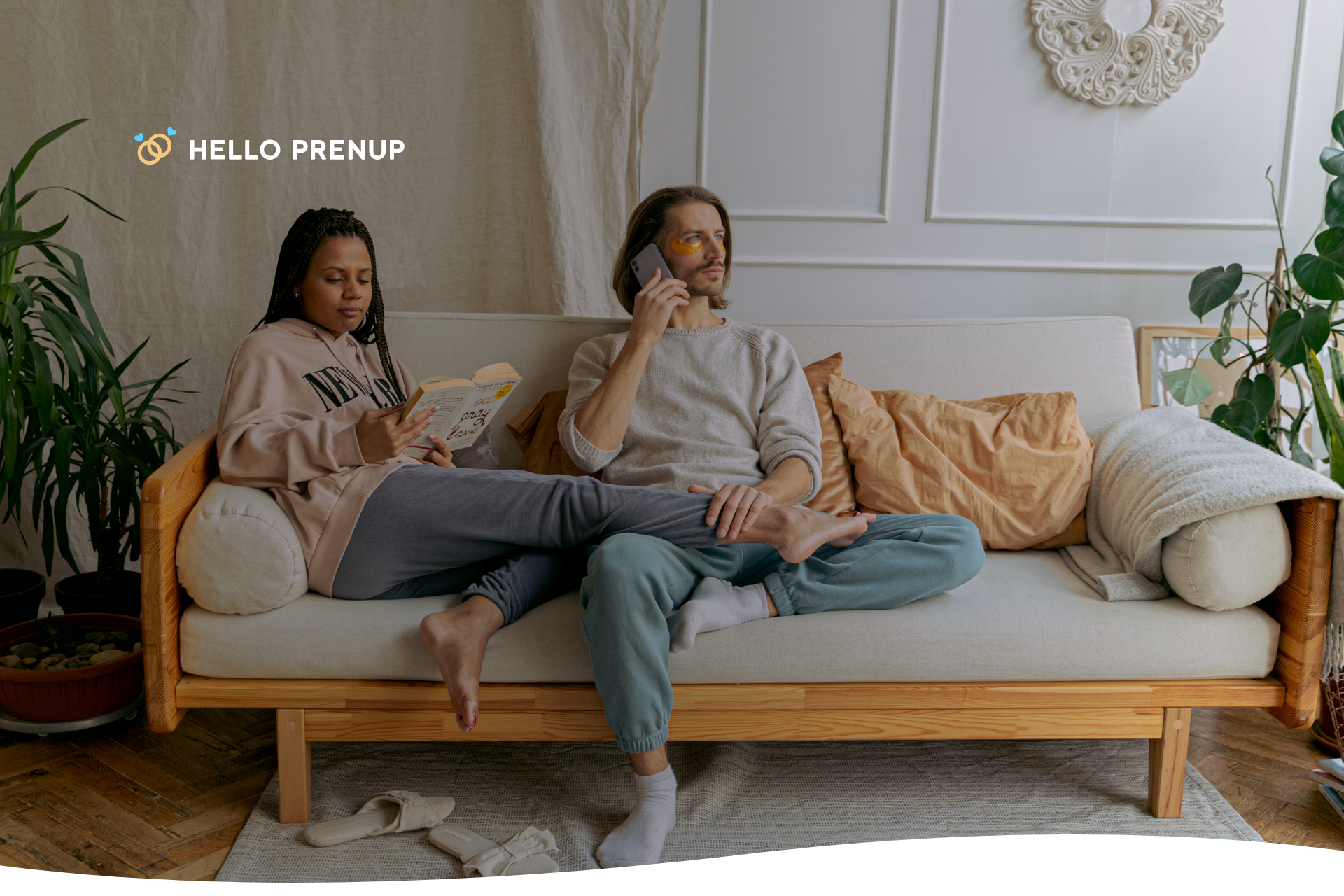 A couple sitting apart on a couch, each looking in a different direction, representing the emotional distance and communication breakdown caused by depression.