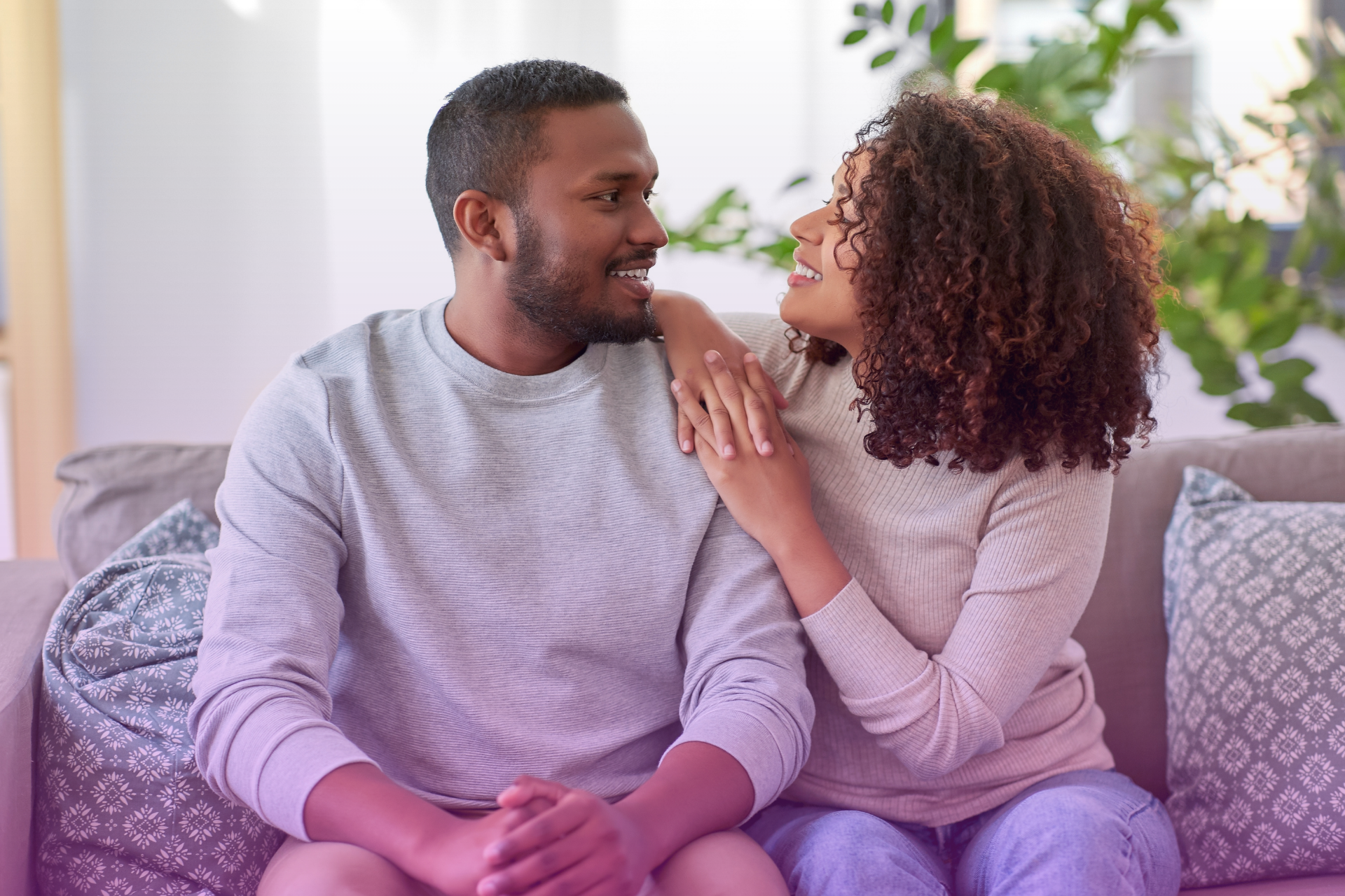 One partner calmly and clearly explaining their perspective to the other, symbolizing open and respectful communication.