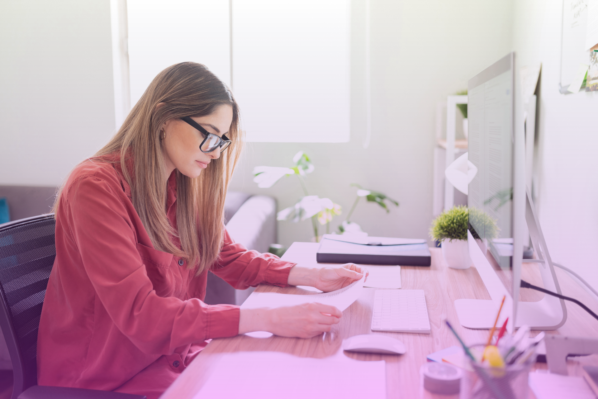 A person carefully reviewing a legal document that has been translated into their native language, with a look of understanding.