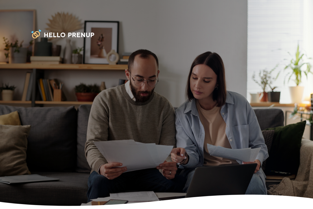 Louisiana couple reviewing financial documents while deciding whether they need a lawyer for their prenup