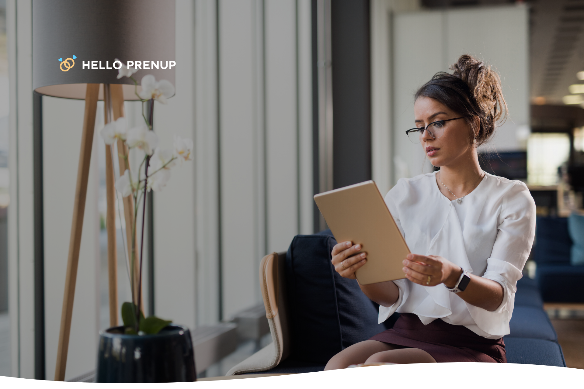 A person reviewing a business financial report on a tablet, symbolizing the need for a complex business valuation in a high-asset prenup.
