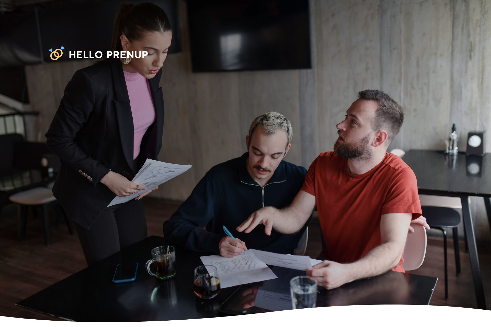 A couple sits with their lawyer and reviews a legal trust document, representing a collaborative approach to estate planning.