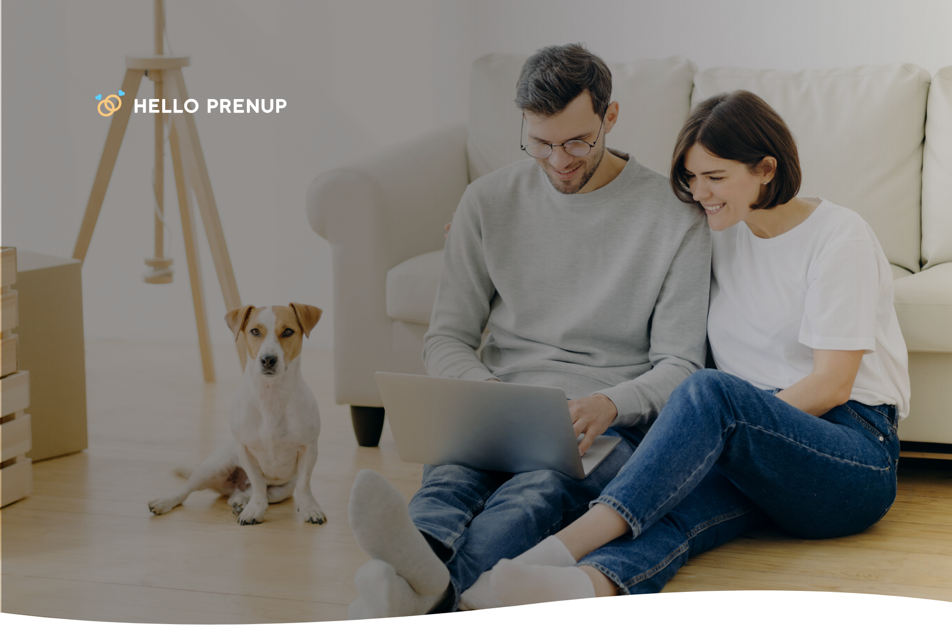 a couple looking at a computer screen with a confident expression A couple is looking at a computer screen together with confident expressions, symbolizing the collaborative and informed approach of creating a prenup.