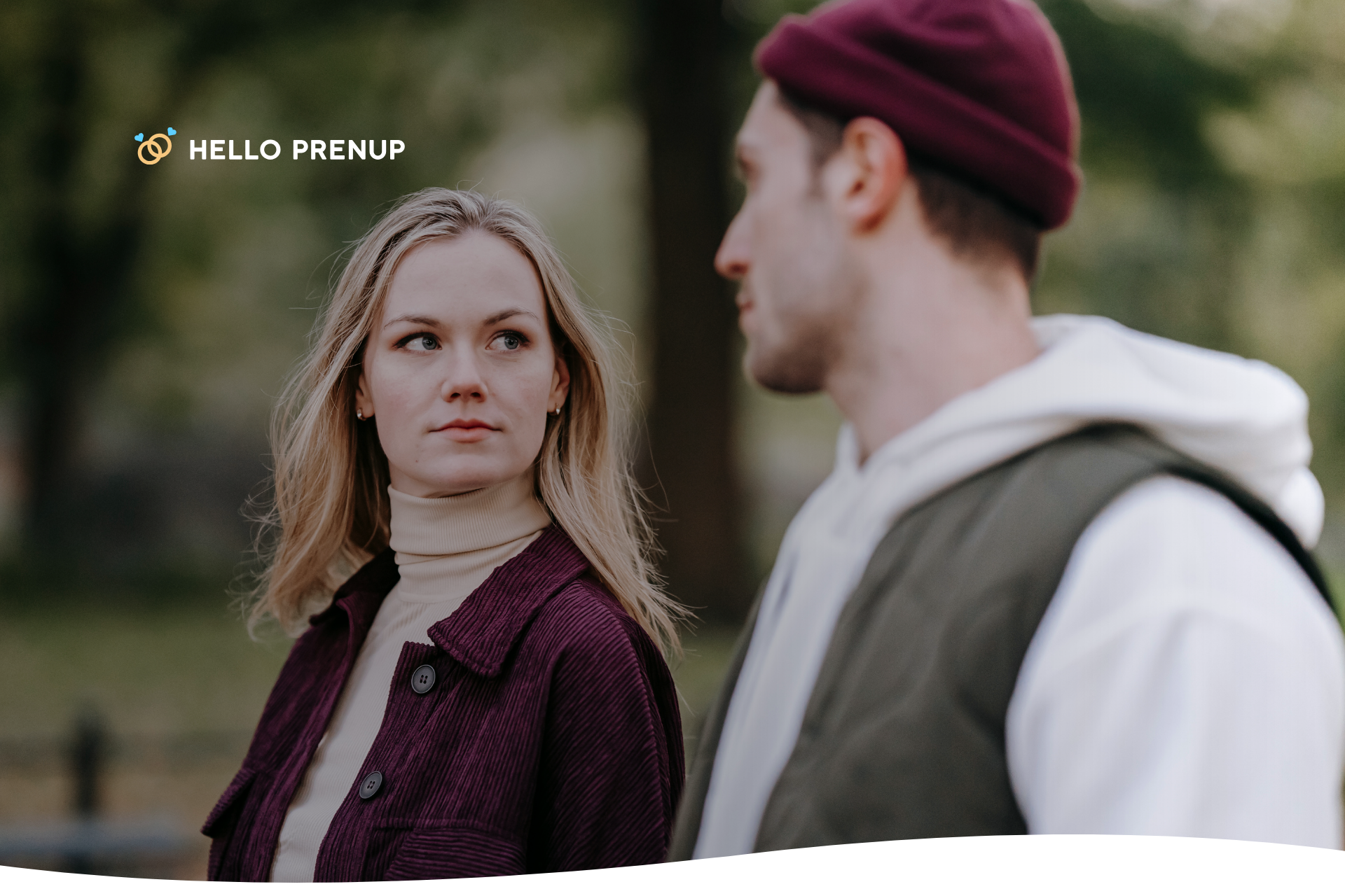 a couple looking at each other, one with a very serious, concerned face A couple looks at each other, one with a very serious, concerned face, representing the emotional weight and worry caused by a partner's distance.