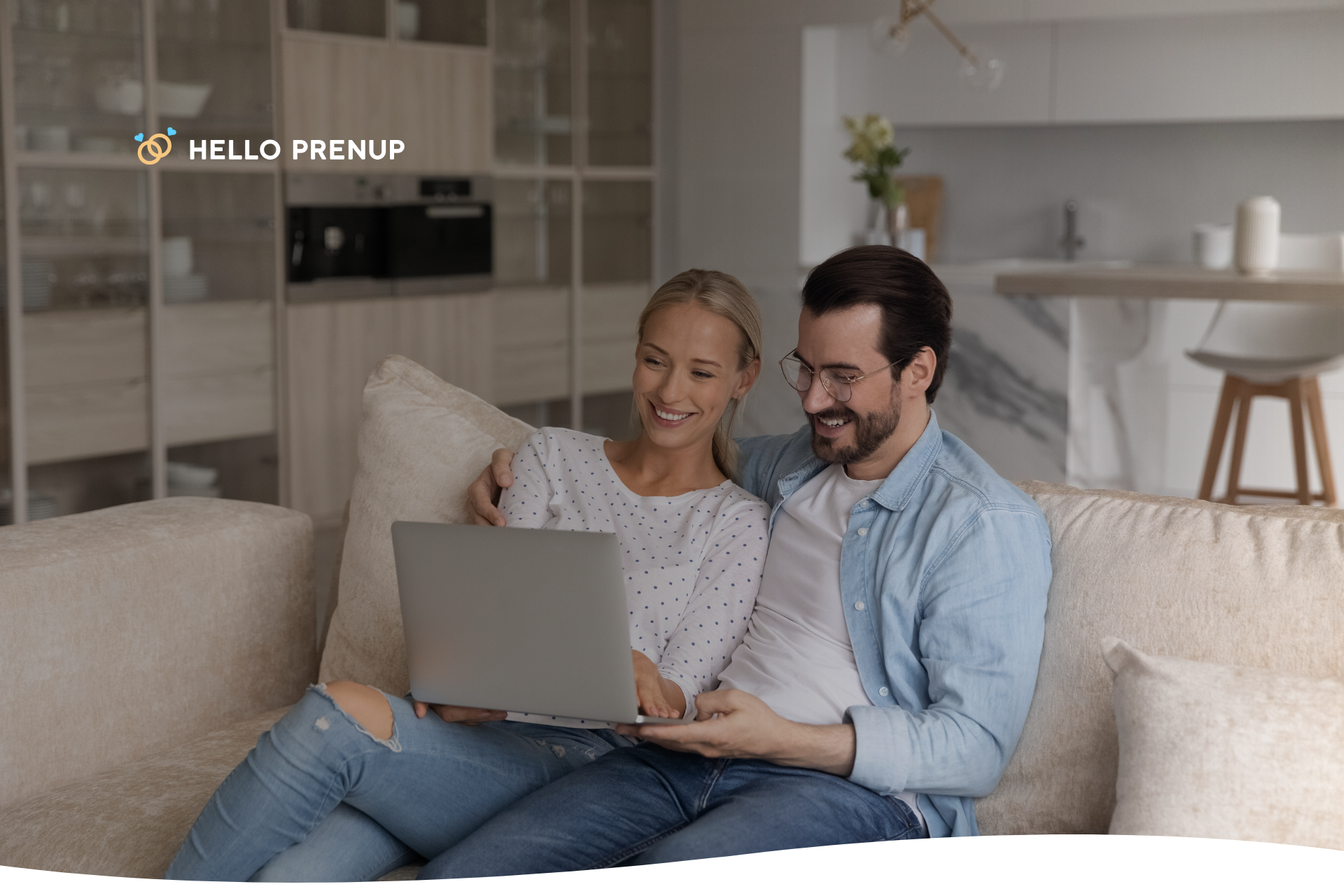 A couple uses a laptop together, symbolizing the collaborative and cost-effective nature of using an online service to begin their prenup