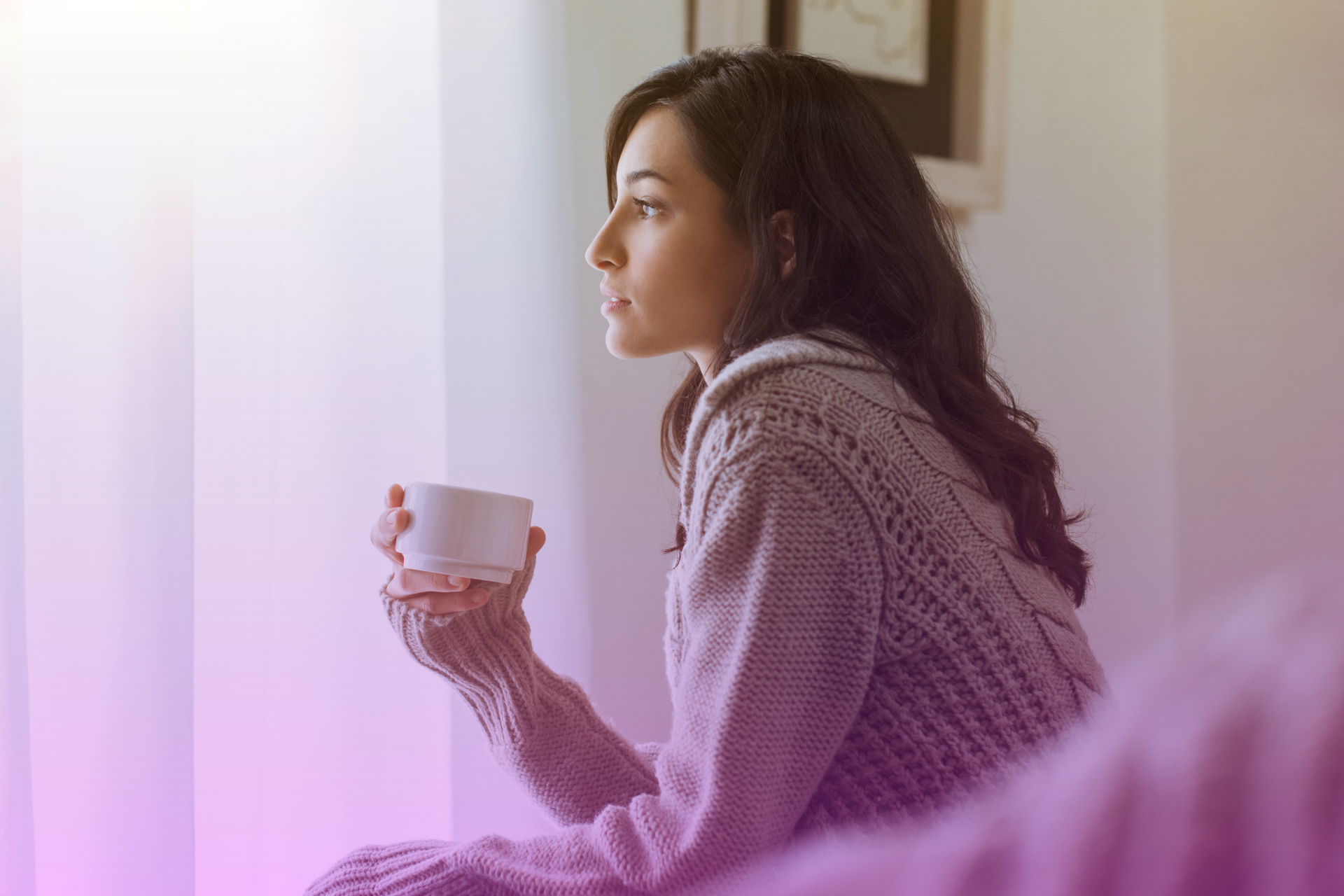 A person sits calmly at a table, looking thoughtful, representing the careful consideration and planning that goes into a successful prenup.