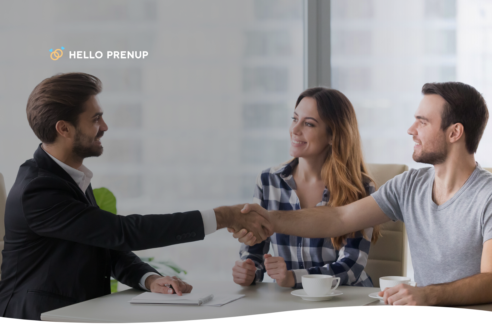 A couple sits calmly at a table, collaboratively reviewing a large legal document, symbolizing the proactive clarity a postnup provides