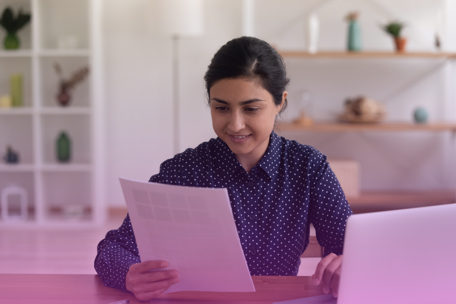 One partner reviews a legal document (e.g., a Power of Attorney) with their spouse, symbolizing the need to create legal protection in case of incapacitation.