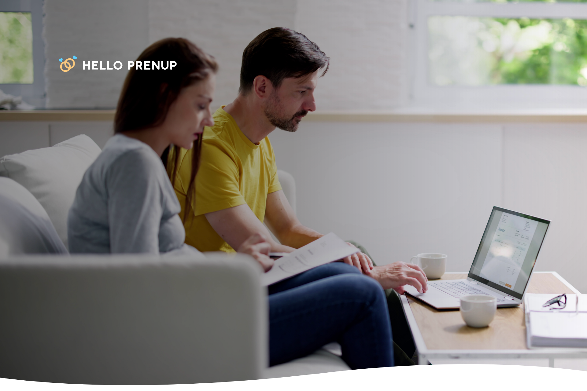 A couple sitting calmly at a table, scheduling a "money date" or check-in on a notepad, representing the importance of dedicated communication time.