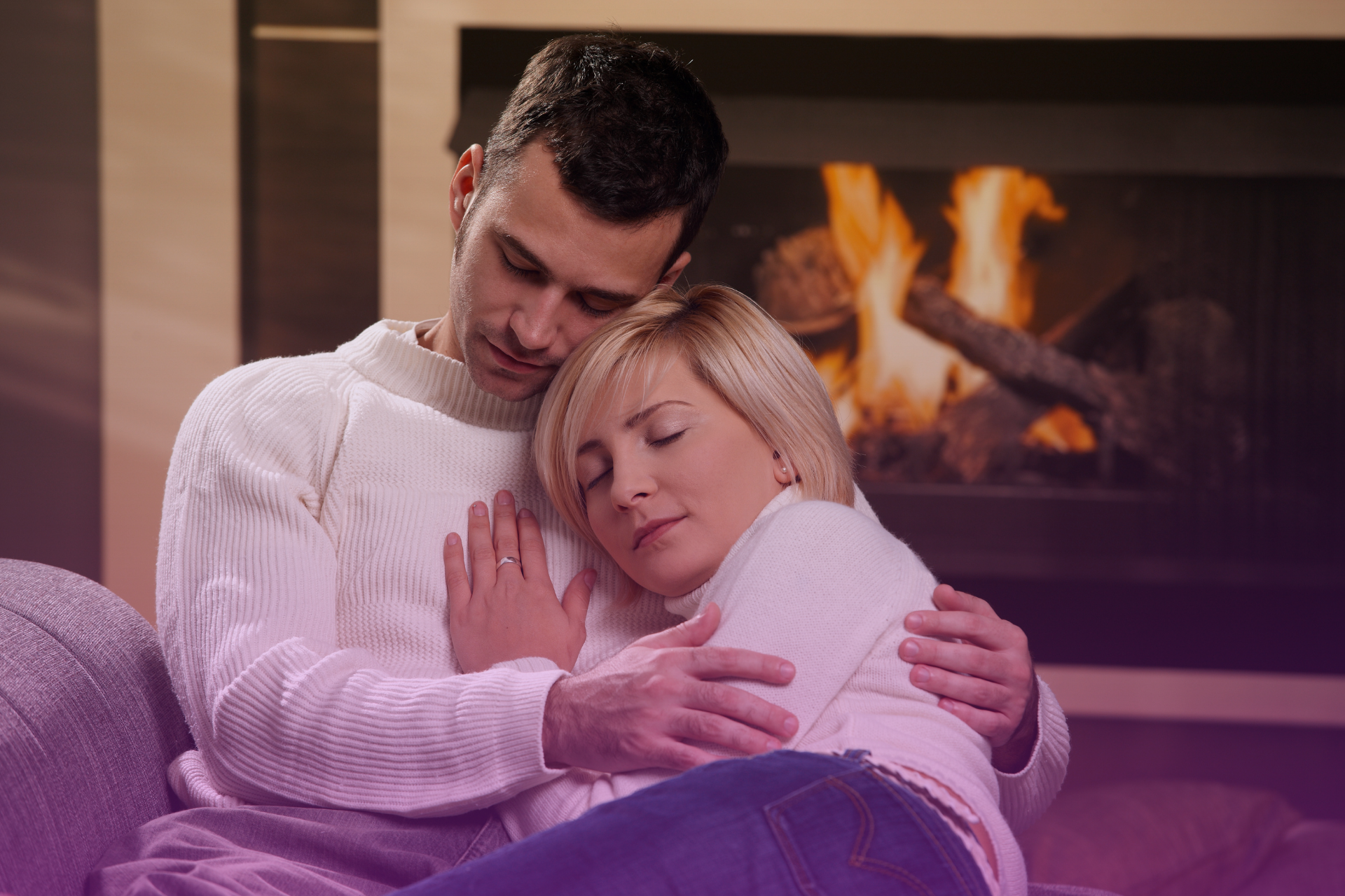 A person looking gently at their partner, who is speaking with tearful eyes, representing empathetic listening and validation of pain.
