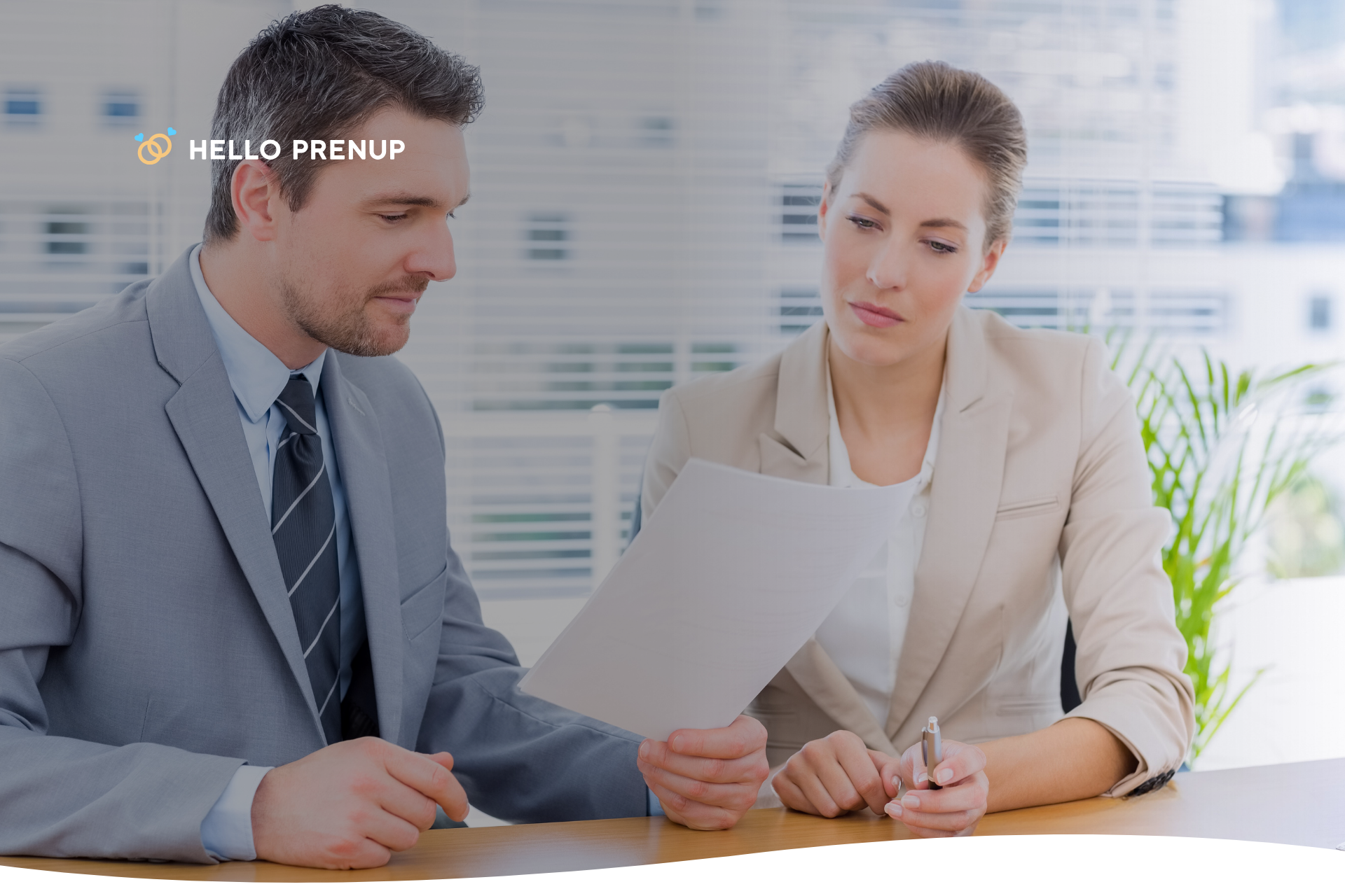 A diverse couple speaking seriously with a financial advisor about who to appoint as trustee for their living trust.