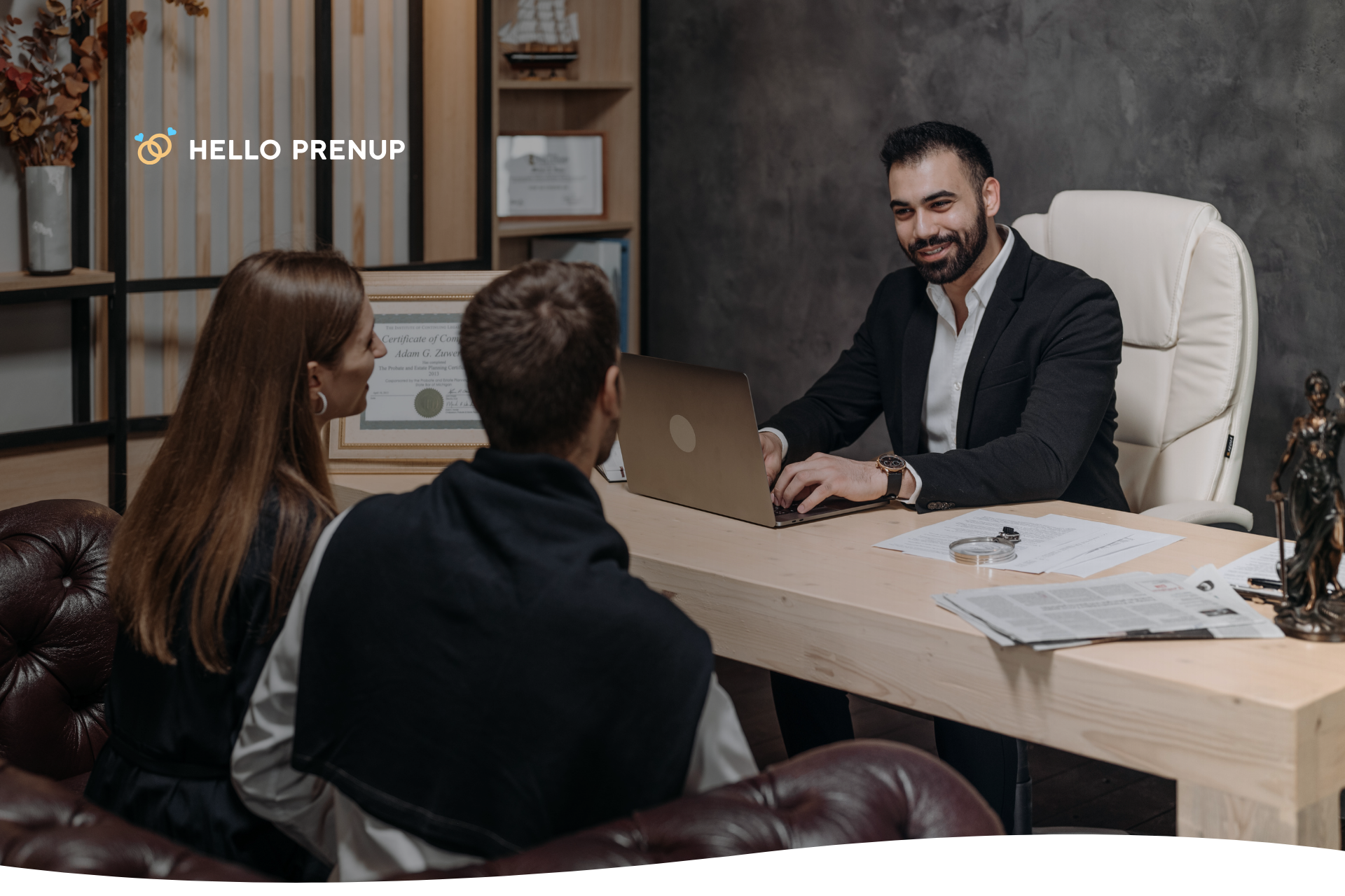 Couple signing documents with attorney to ensure legal compliance