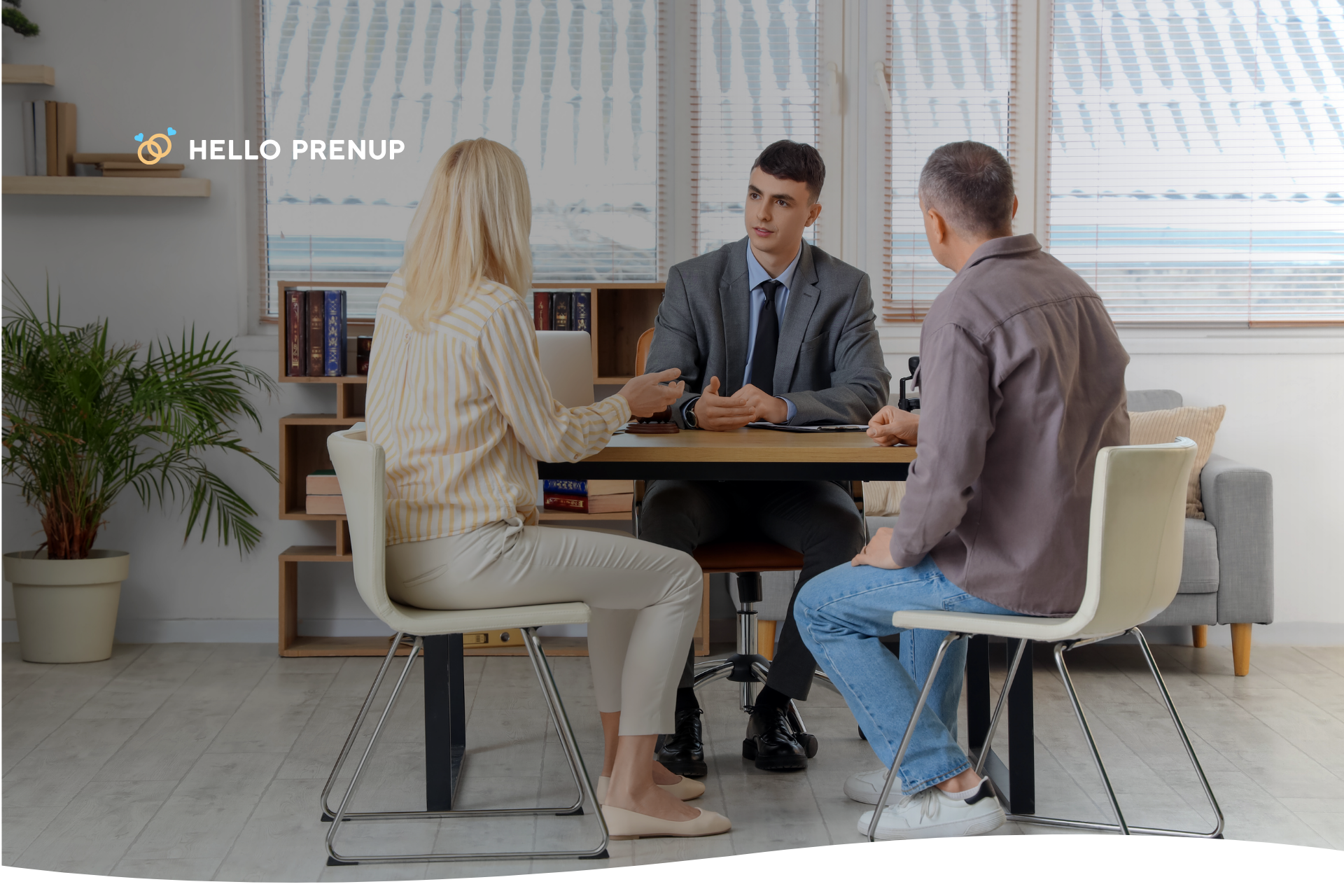 Couple meeting with a family-law attorney to go through postnuptial terms