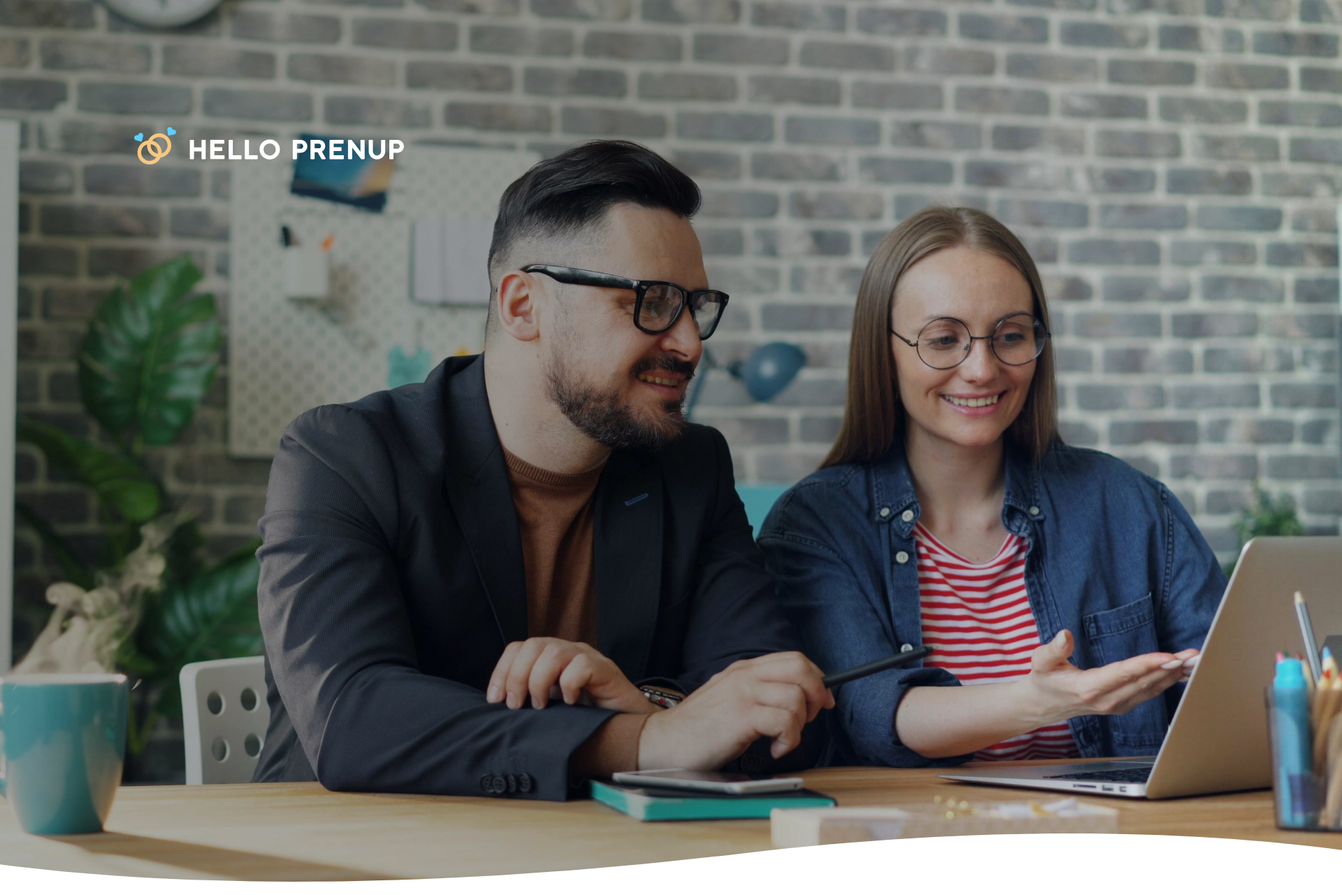 Couple meeting a family-law attorney in Michigan to discuss a prenuptial agreement