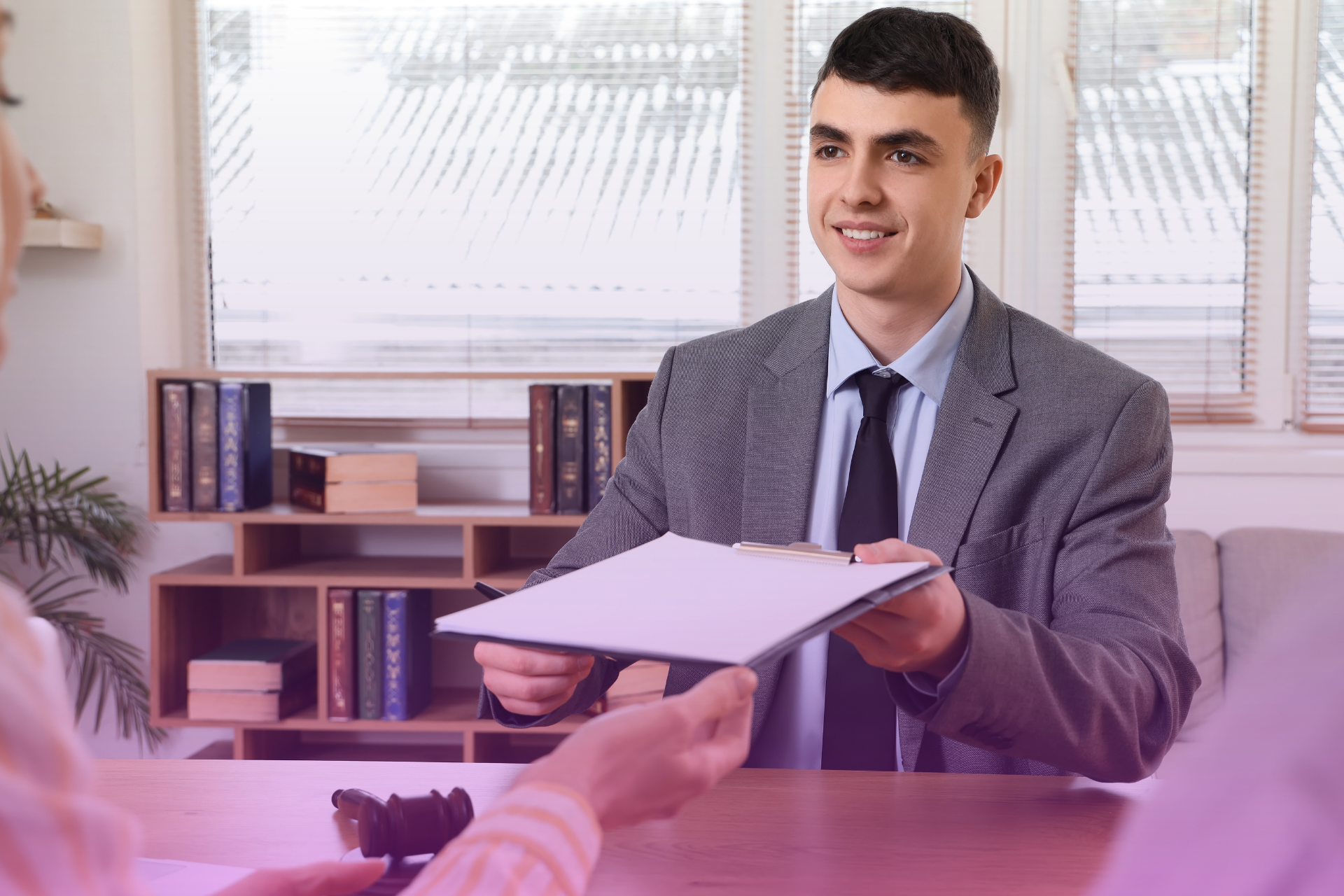 Close-up of a hand pointing to the legal requirement for "Ascertainable Trust Property" on a checklist.