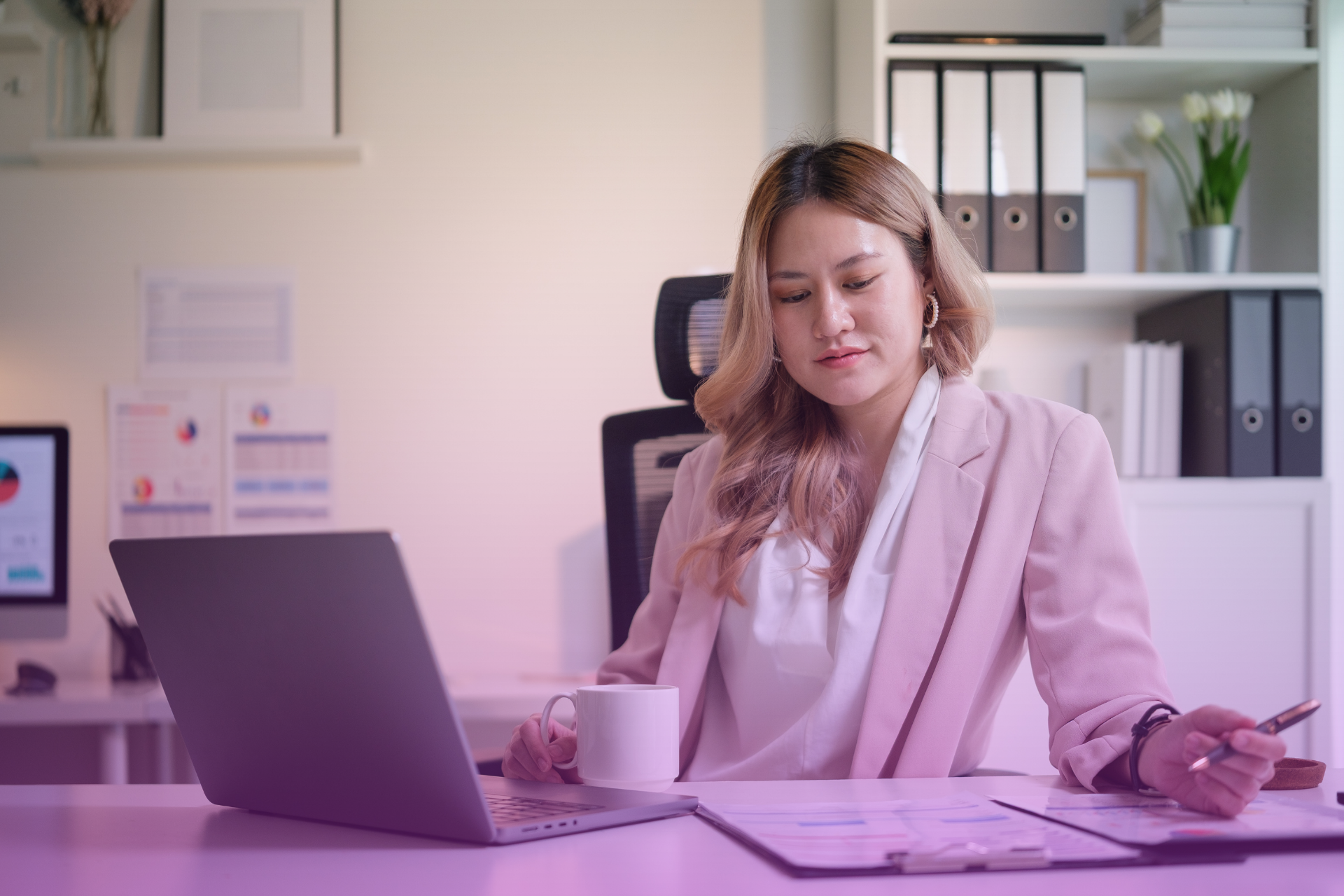 Close-up of a person underlining the 'Trustee' section of a legal document while considering their selection.
