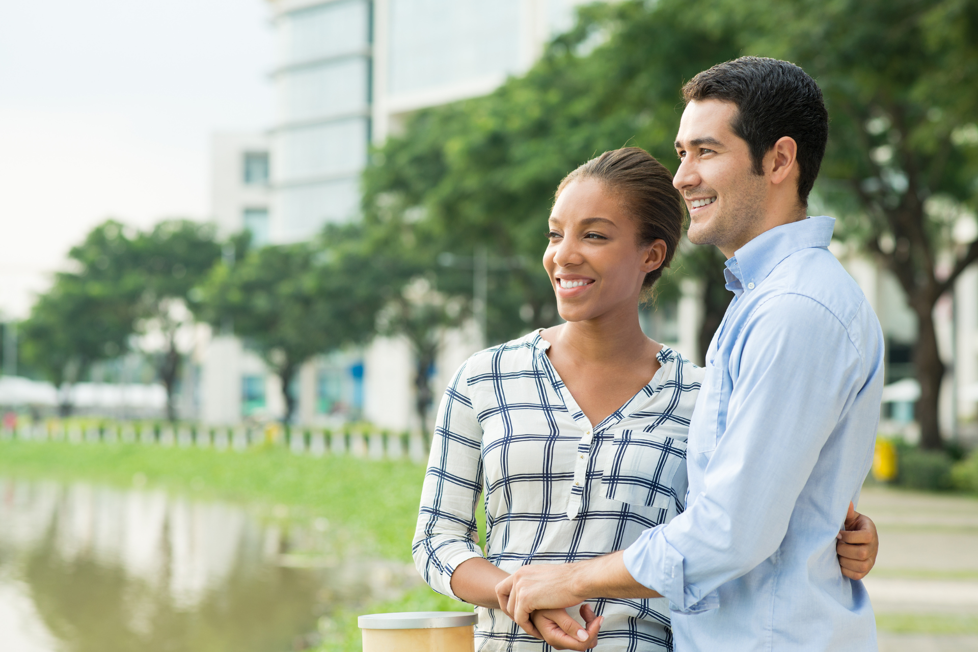 A couple holding hands while walking together, showing connection and intimacy