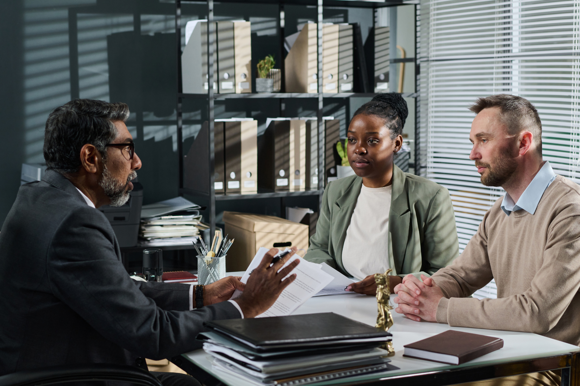 Couple meeting with a lawyer in an office