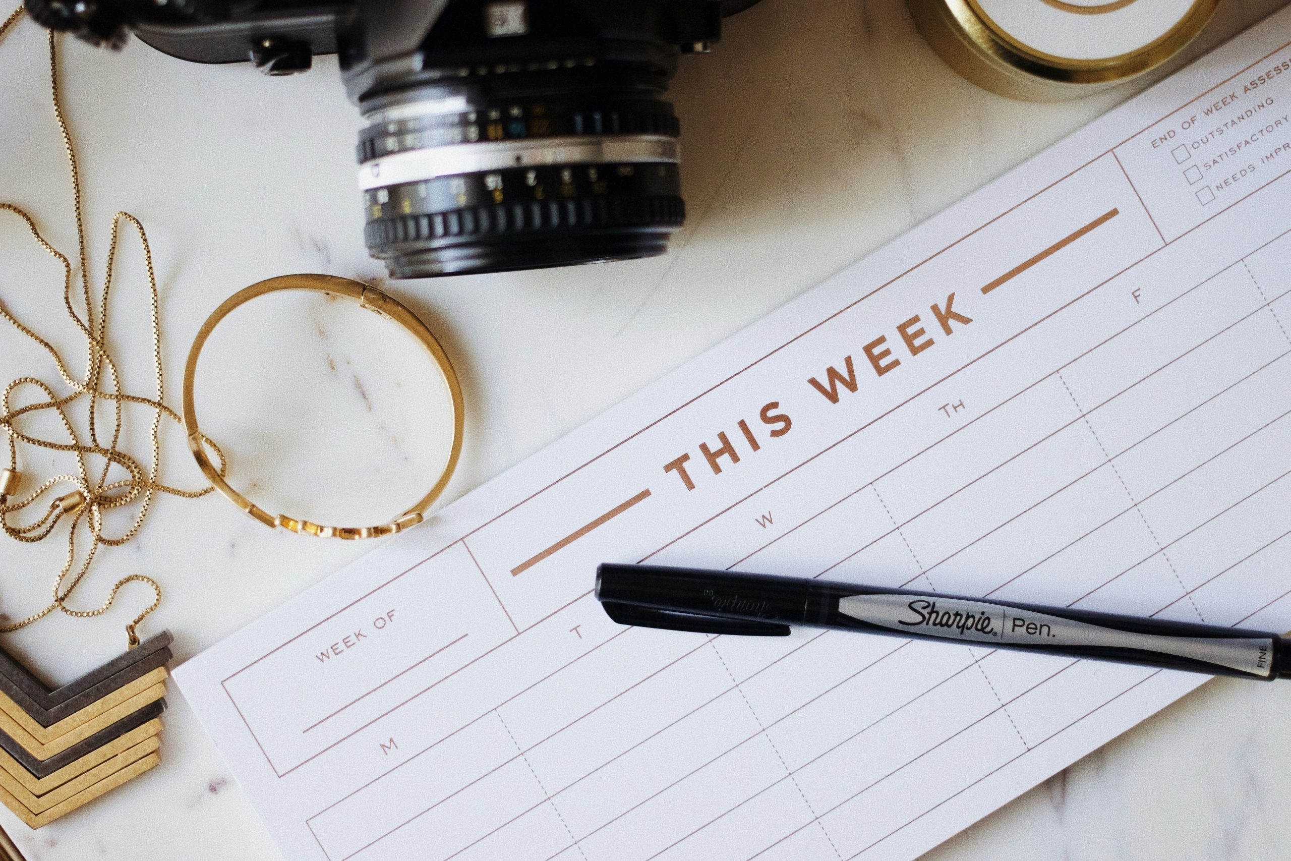 A calendar used for wedding planning, showing dates, notes, and tasks organized to manage the event timeline