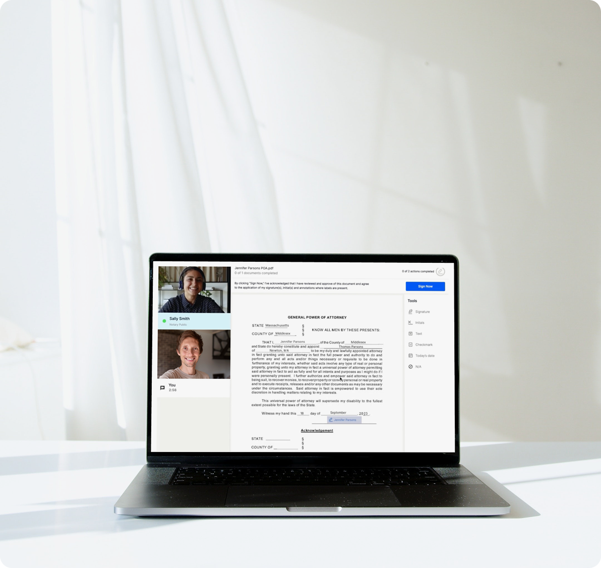 Laptop showing HelloPrenup notarization video call with Proof