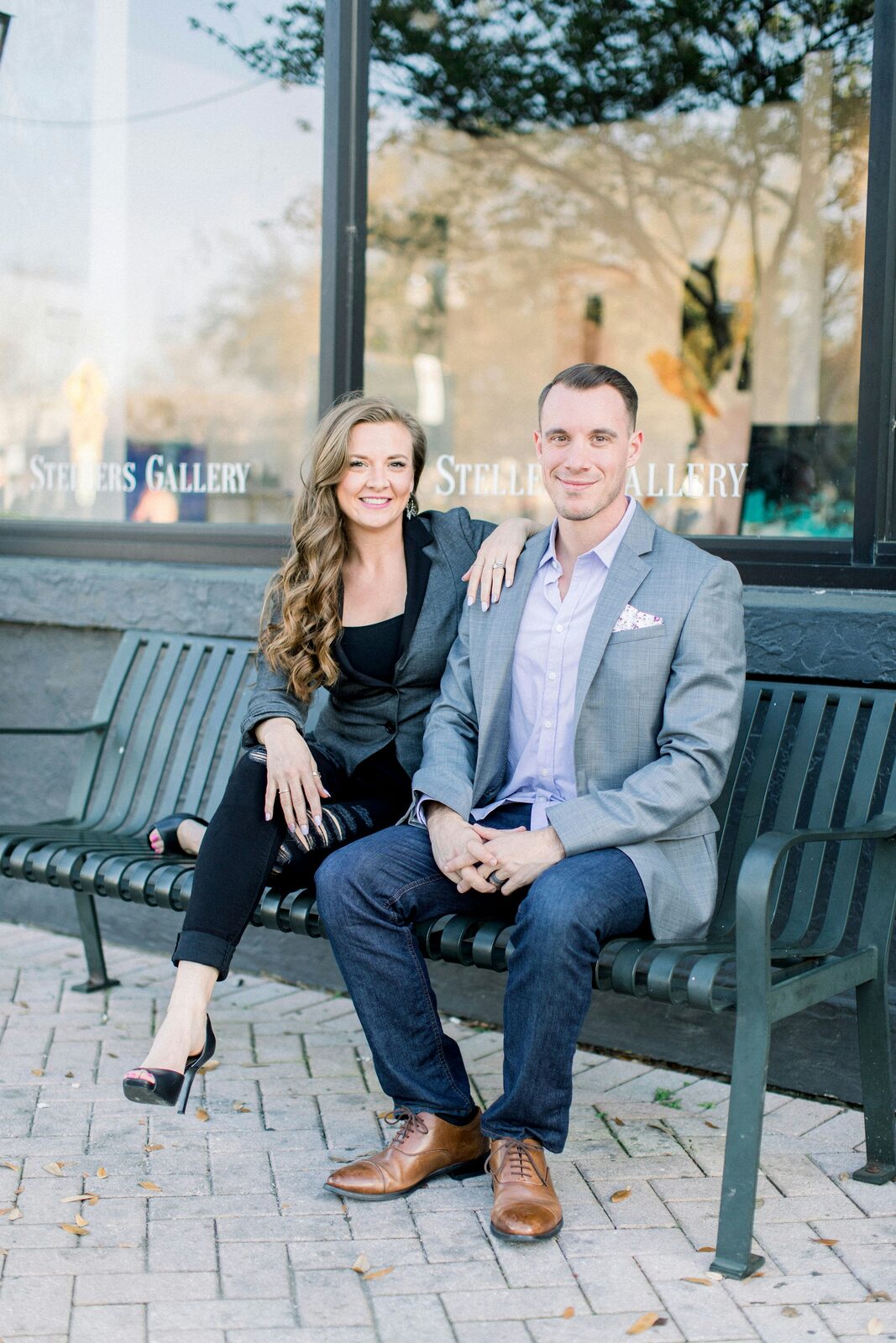 Washington couple sitting on a park bench, talking about marital property and alimony in their prenuptial agreement
