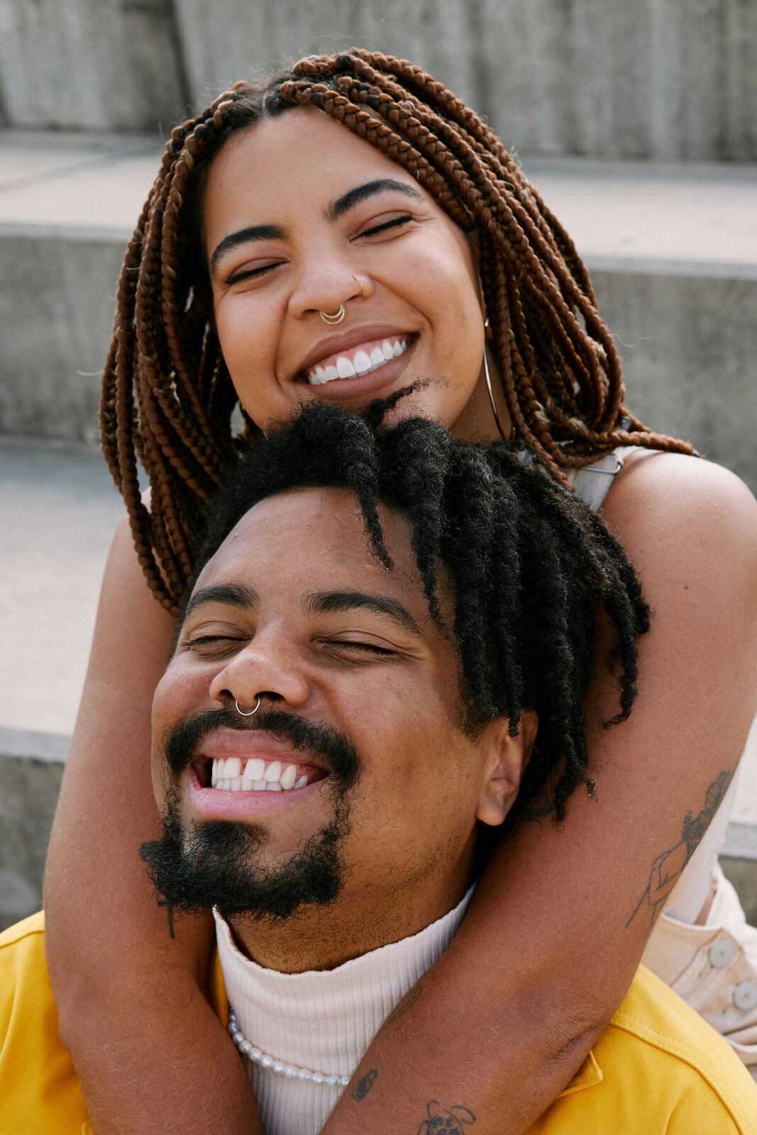 West Virginia couple laughing together outdoors, celebrating their engagement