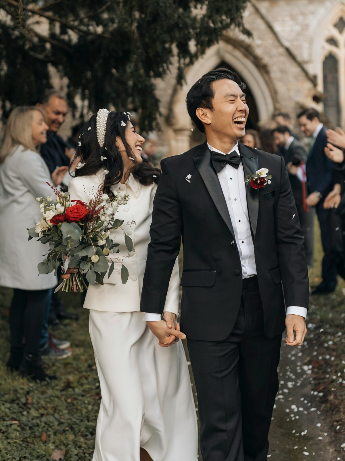 New Jersey newlyweds leaving their church wedding through a confetti toss