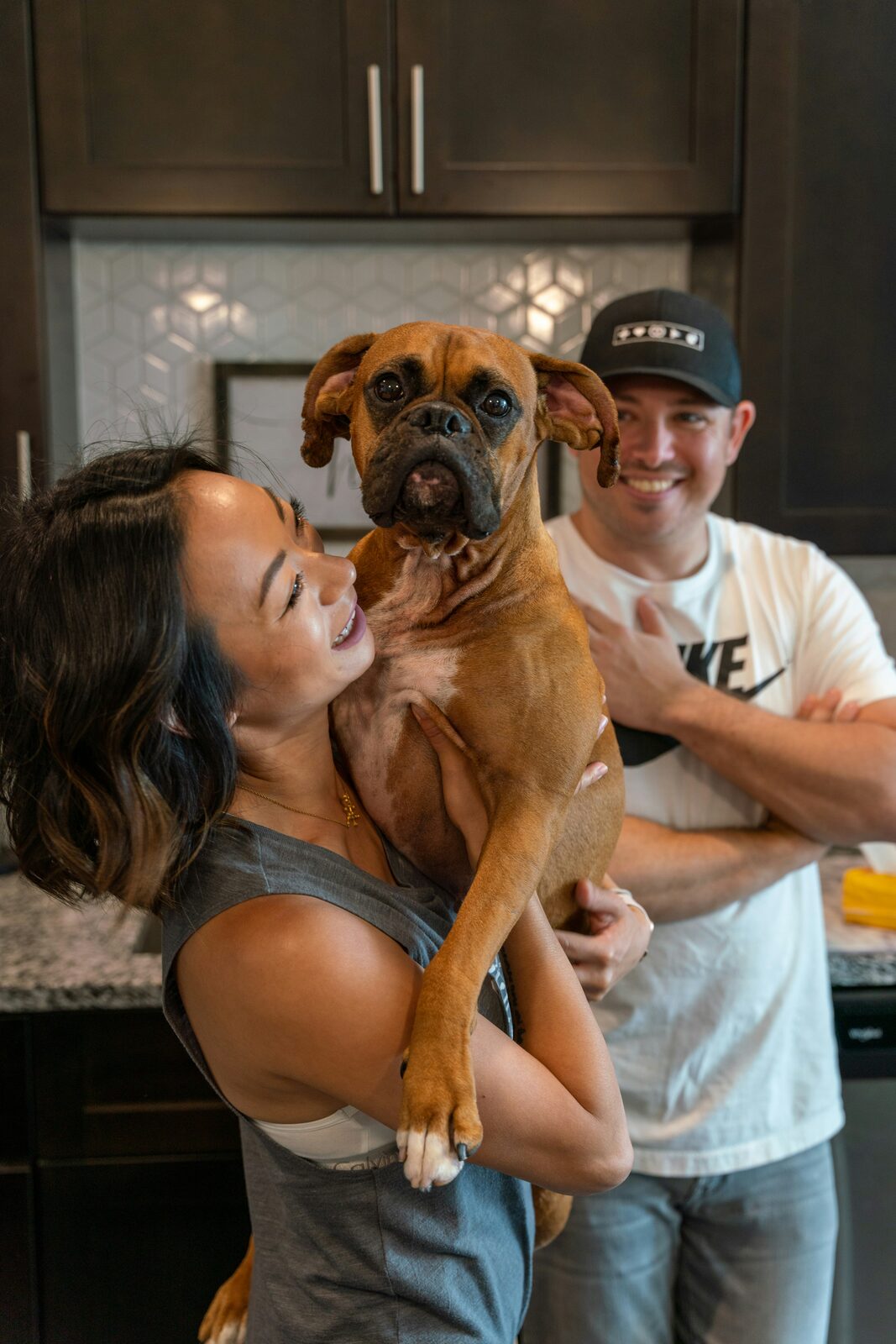 Georgia couple at home with their dog, reviewing finances for prenup disclosure