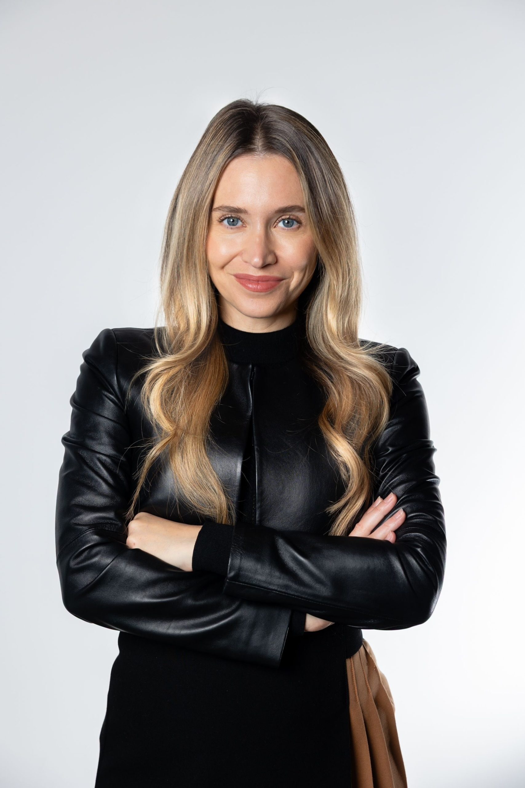 Headshot of Julia Rodgers, Esq., family law attorney, founder and CEO of HelloPrenup, and legal reviewer of this Alabama prenup guide
