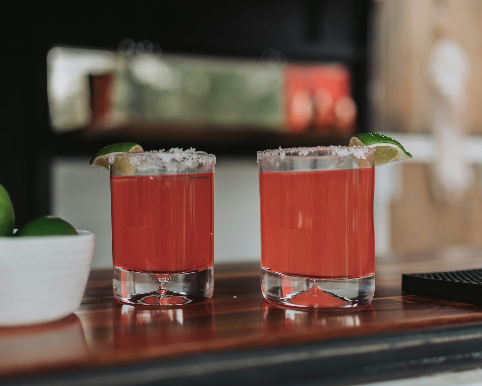 Two Arizona desert cocktails with salted rims and lime, ready to toast a finished prenup