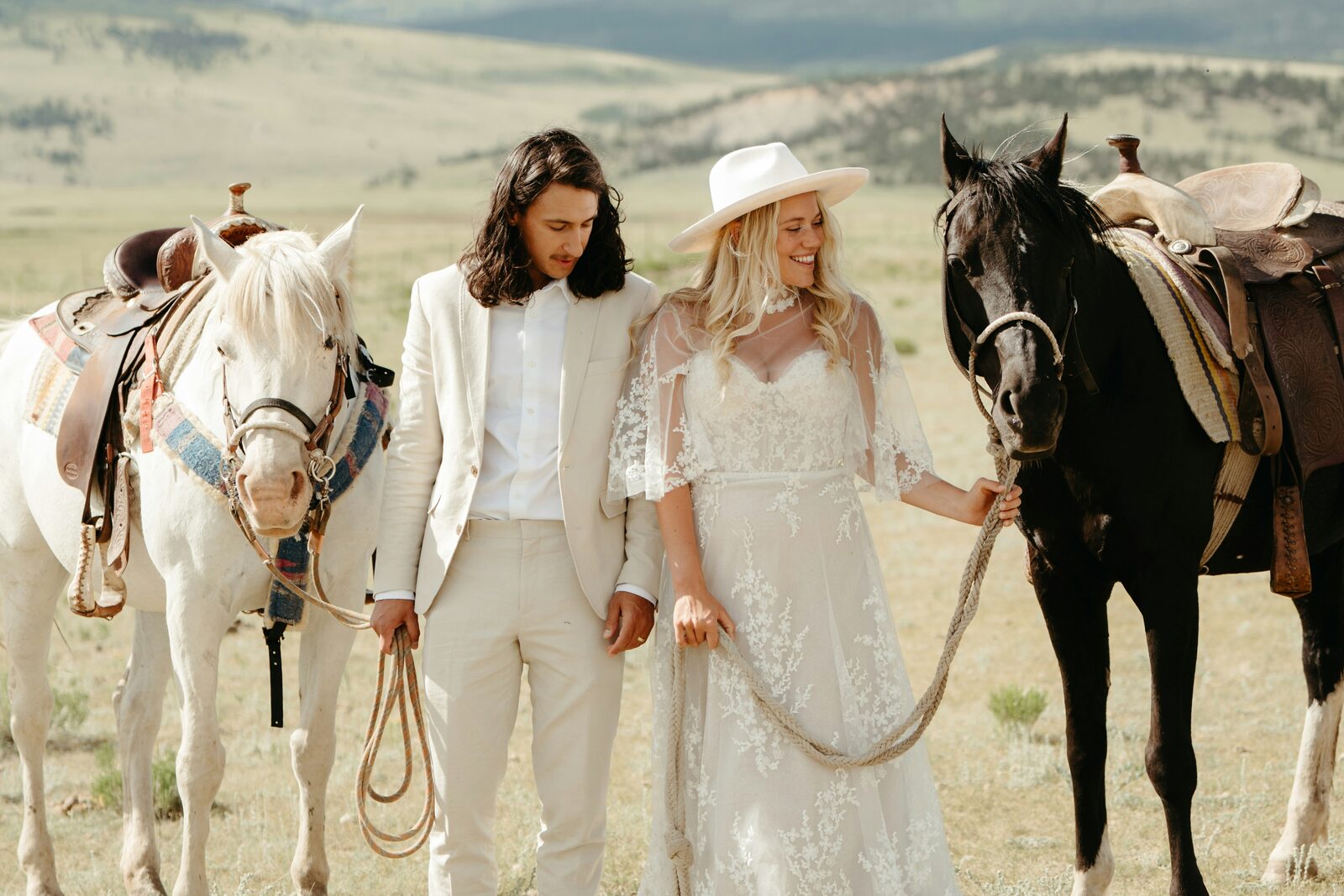 North Carolina bride and groom eloping at a ranch with horses, reflecting the property a prenup can protect