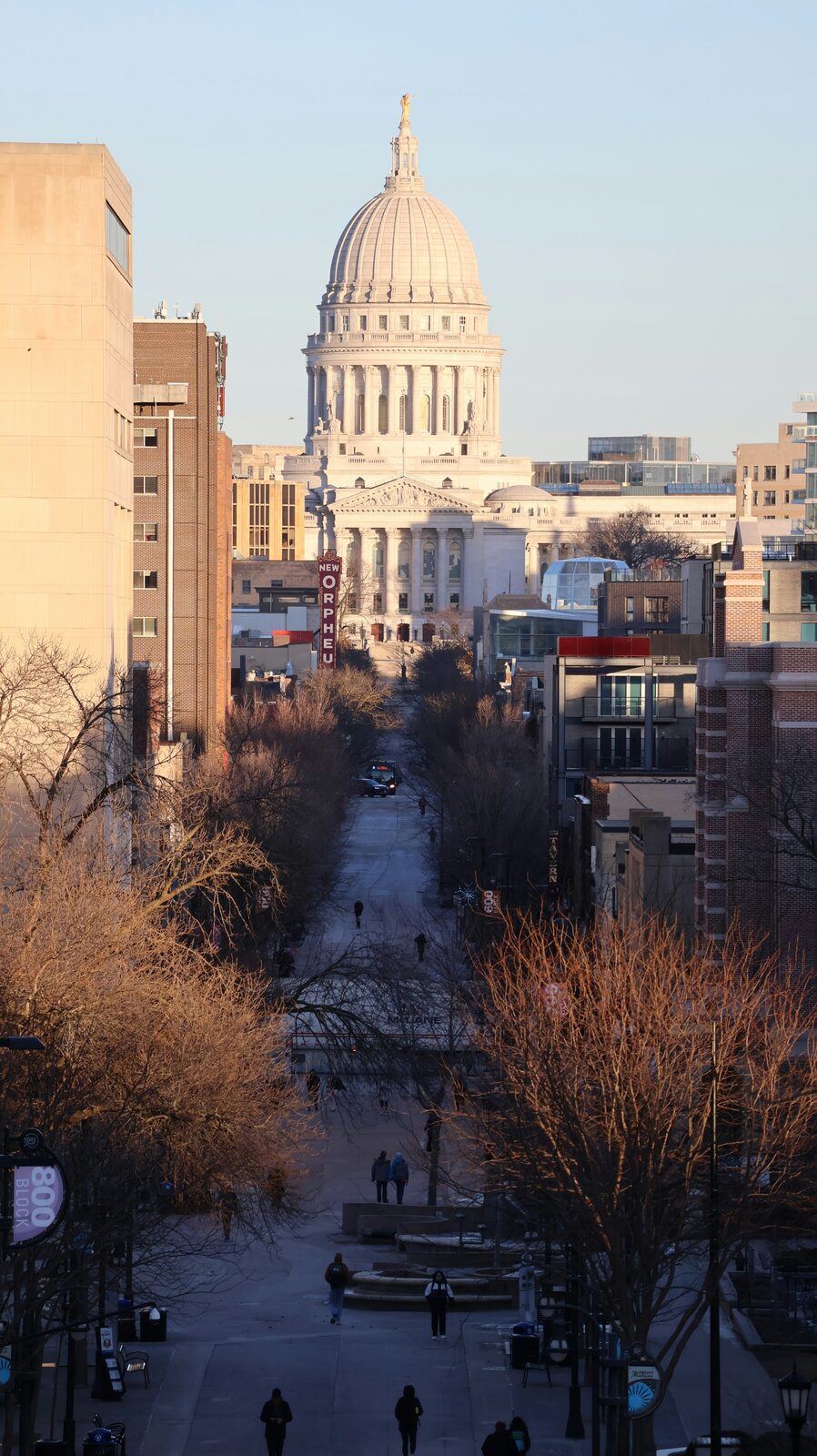The Wisconsin State Capitol and State Street in Madison at golden hour in winter