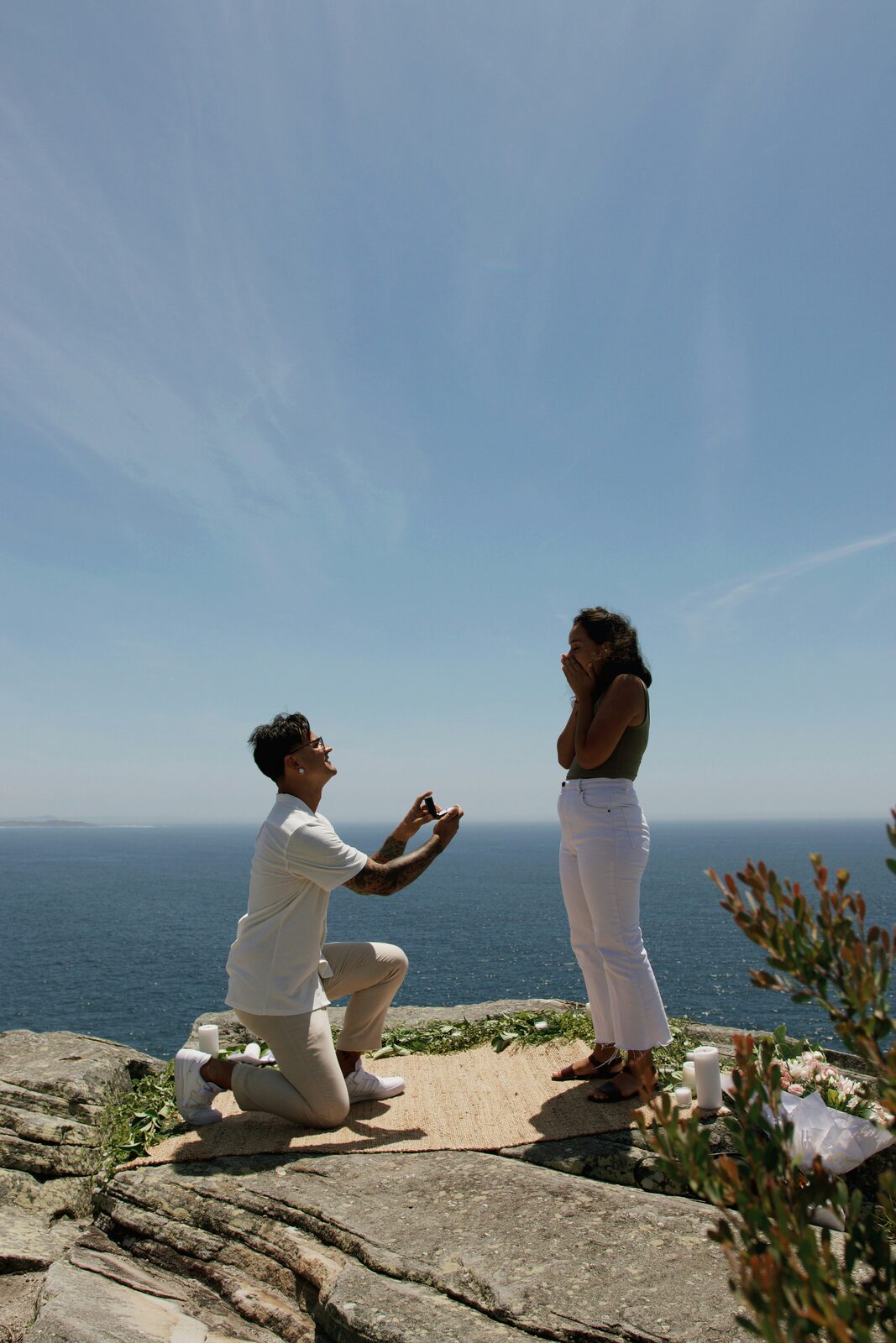 Ohio couple celebrating their engagement at an oceanside cliffside proposal