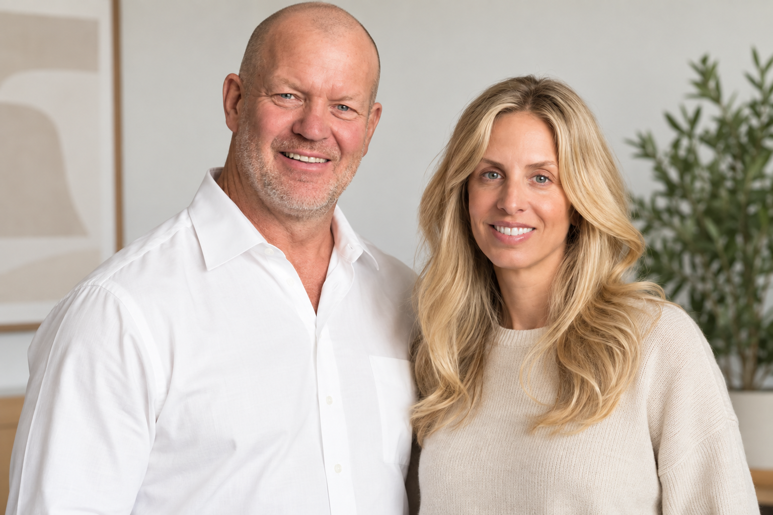 Chip Wilson and Summer Wilson posing together for a photograph.