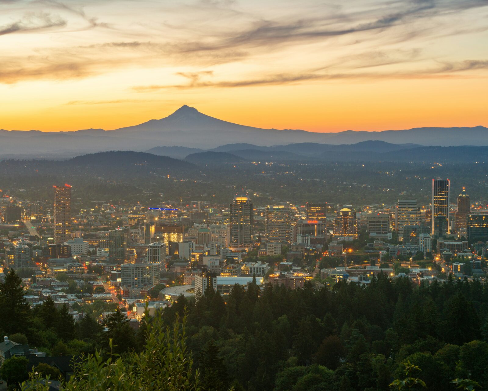 The Portland, Oregon skyline and Mount Hood at sunset from the Pittock Mansion viewpoint