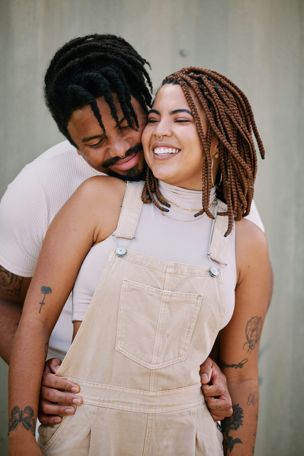 Joyful Indiana couple hugging close after completing their prenup