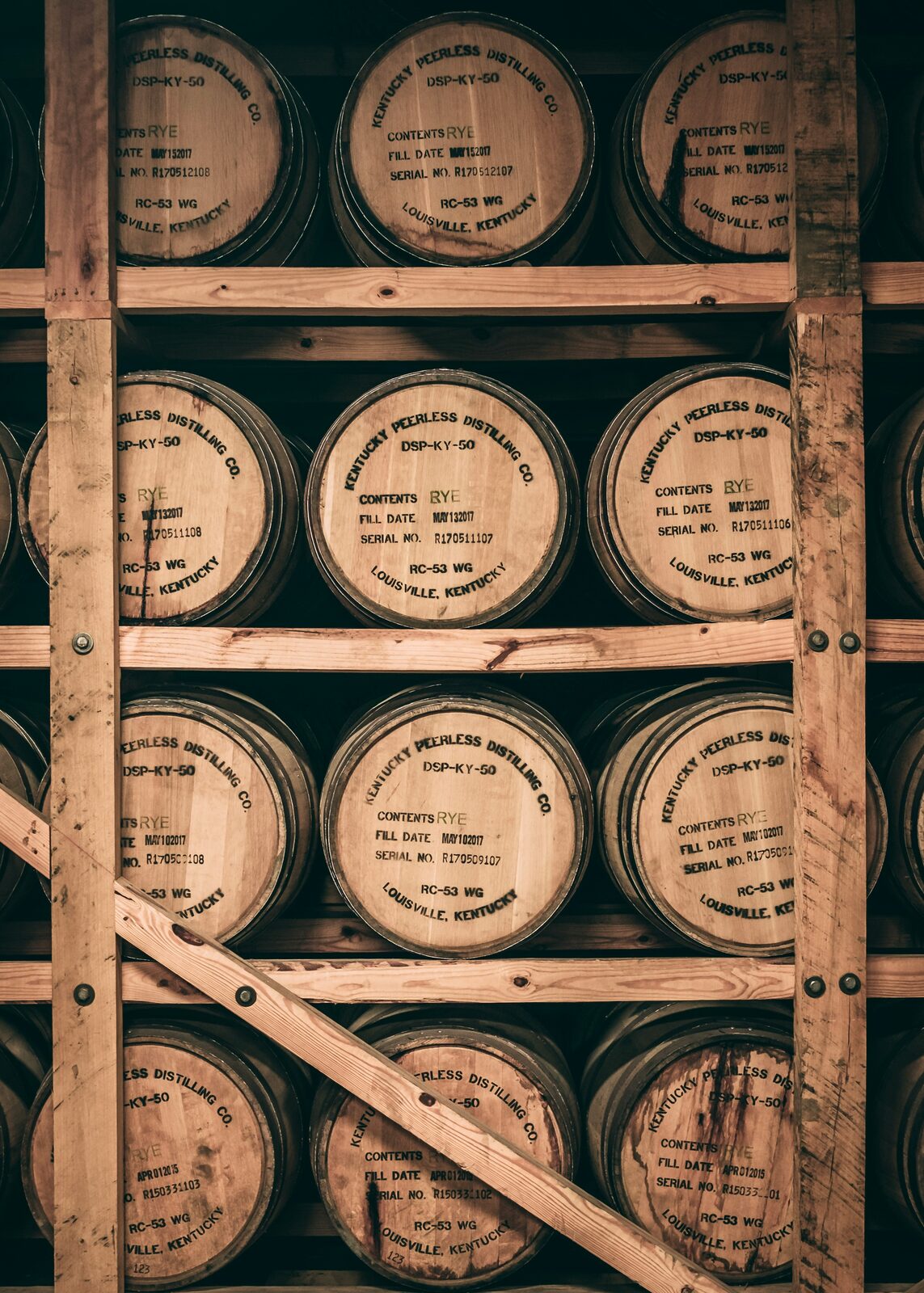 Bourbon barrels stacked in a rickhouse at Peerless Distilling in Louisville, Kentucky